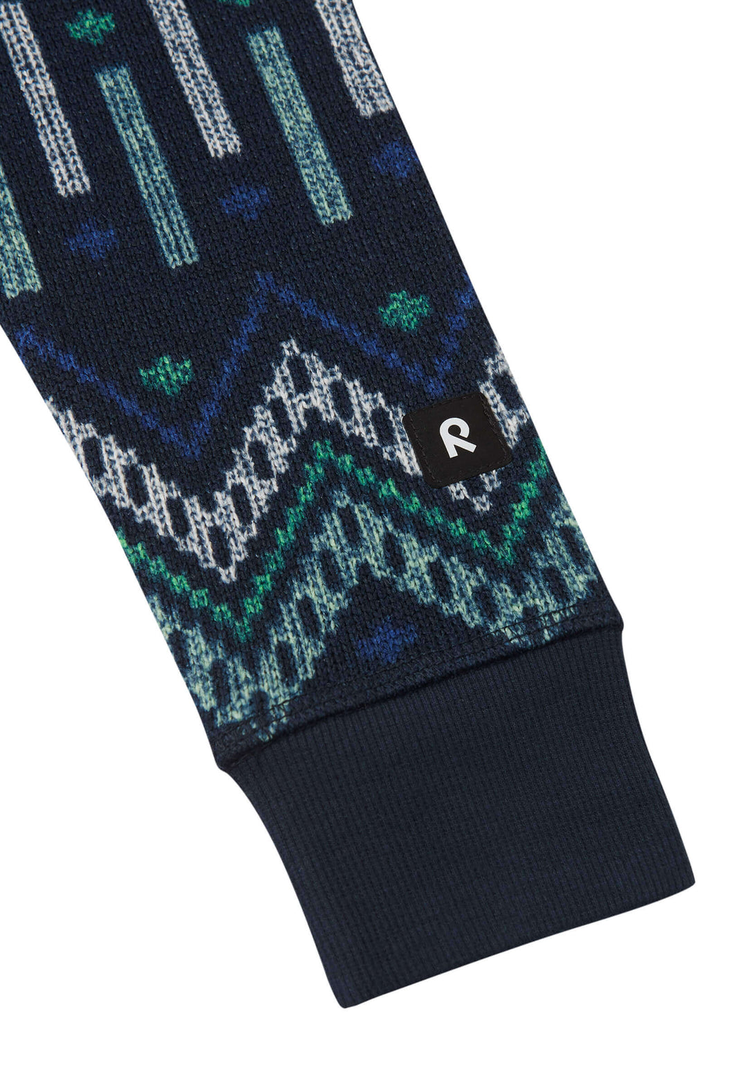 Close-up of the patterned sleeve of the Reima Myytti Fleece Overall in navy, featuring colorful geometric designs.