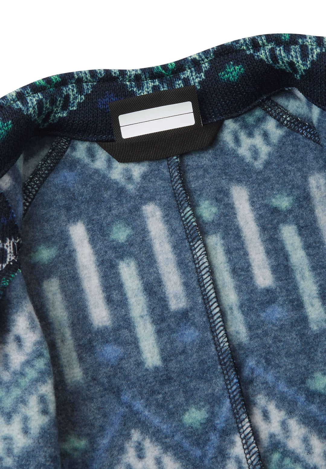 Inside view of Reima Myytti Fleece Overall featuring soft melange fleece with geometric patterns.